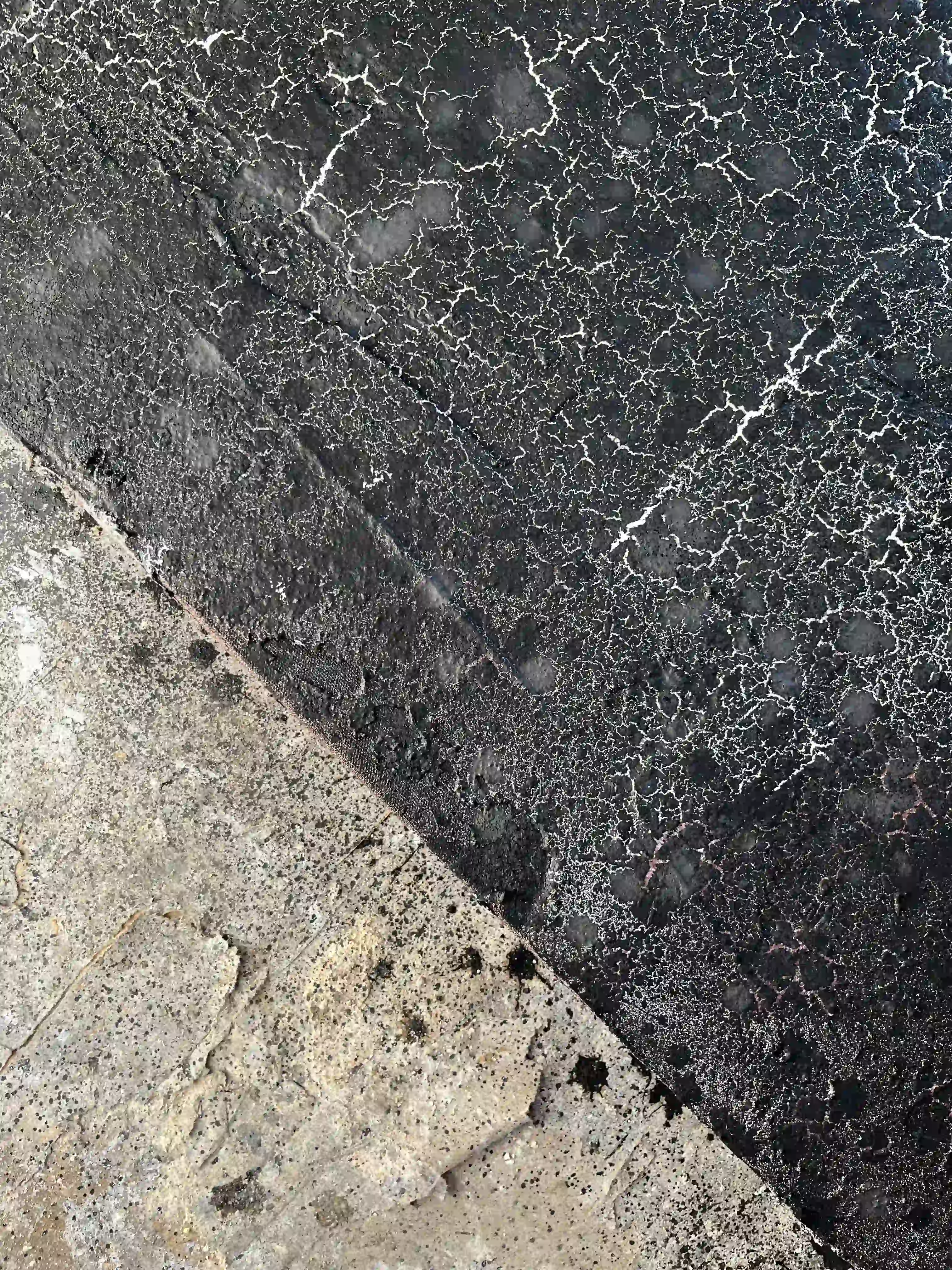 Details of a canvas painting on a studio floor